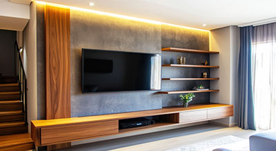 Modern White TV Unit Design With Fluted Panel and Backdrop Lighting
